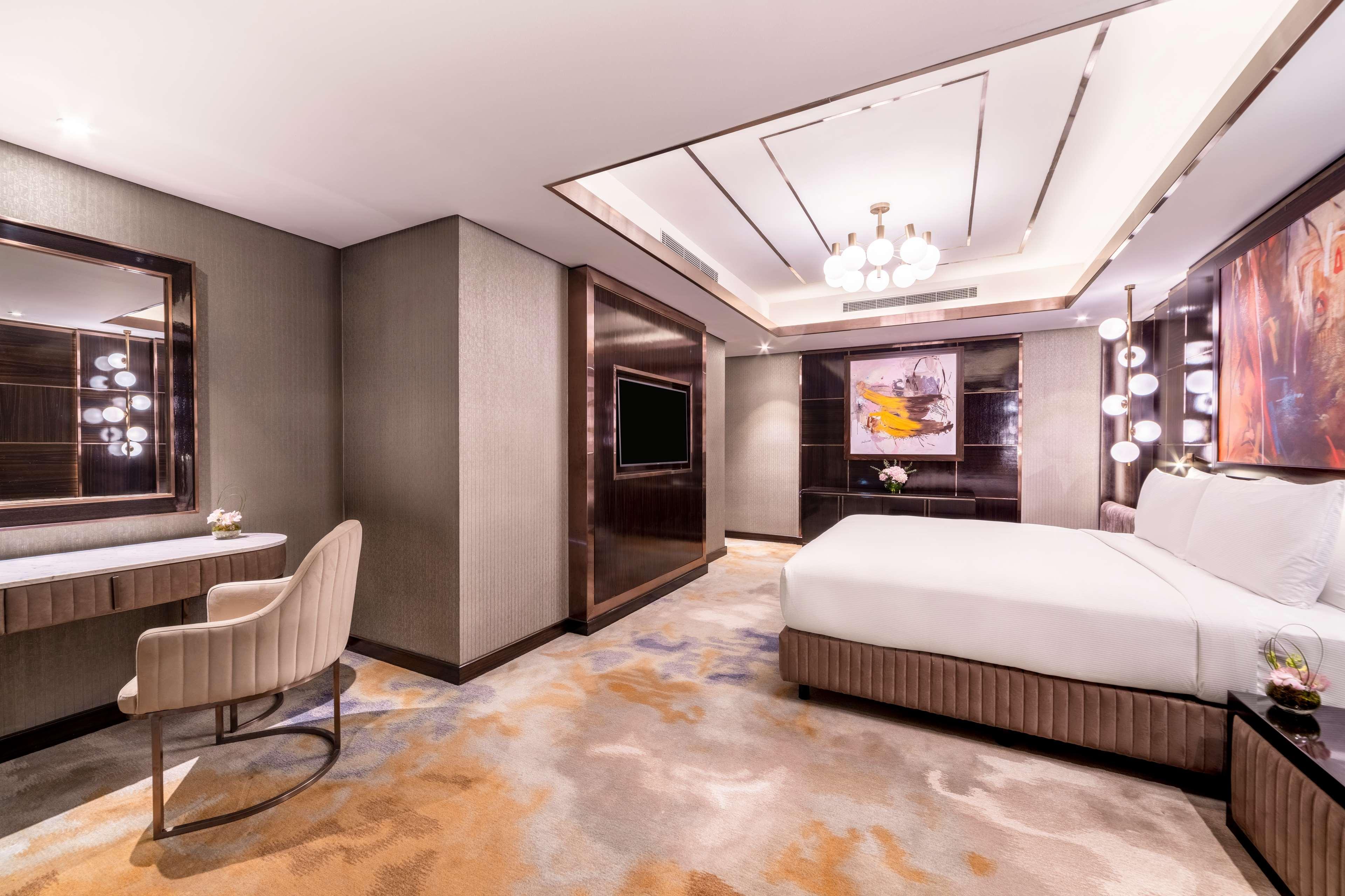 Hotel Hilton Doha The Pearl Exteriér fotografie A bedroom at the hotel